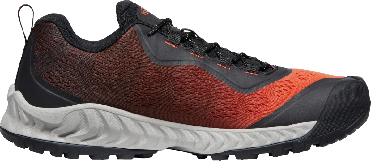 A low-top hiking shoe featuring a fade from burgundy to orange on the upper.