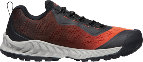 A low-top hiking shoe featuring a fade from burgundy to orange on the upper.
