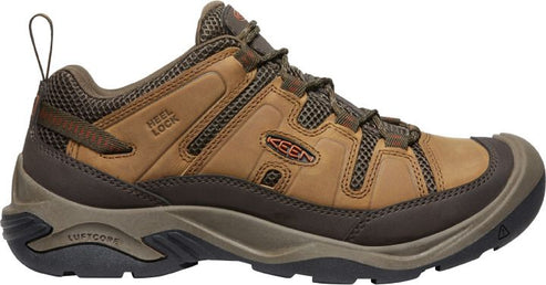 Brown hiking shoe with a low profile, featuring a heel lock and a lugged outsole.