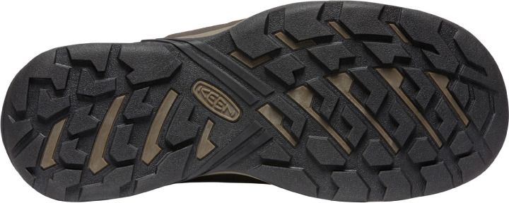 A shoe sole with a dark tread pattern.