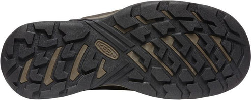 A shoe sole with a dark tread pattern.