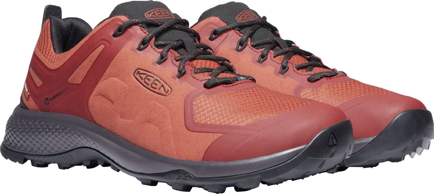 A pair of terracotta KEEN athletic shoes.