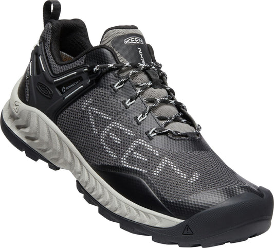 A grey athletic shoe with black accents, gray and white laces, and "KEEN" printed on the side.