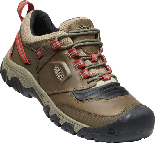 Low-cut olive and tan hiking shoe with red striped laces and heel pull.