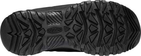 Black shoe sole with geometric tread patterns.