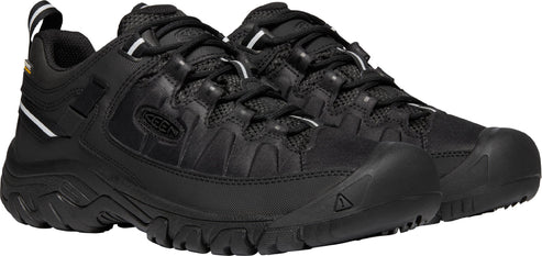 Pair of black hiking shoes with lace-up closure and rubber toe cap.