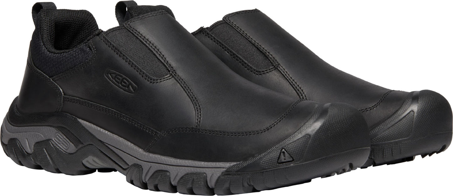 A pair of black slip-on shoes with a thick sole.