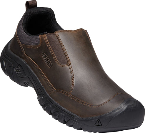 Brown leather slip-on shoe with a black sole and KEEN logo.