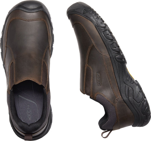A pair of brown leather slip-on shoes with black soles.