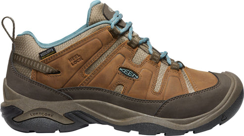 Low-cut hiking shoe with a brown leather upper, teal inner lining and laces, mesh panels, dark toe and heel bumpers, and aggressive tread.