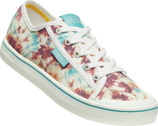 Tie-dye-patterned low-top canvas sneaker with white laces and a light blue tongue tag.
