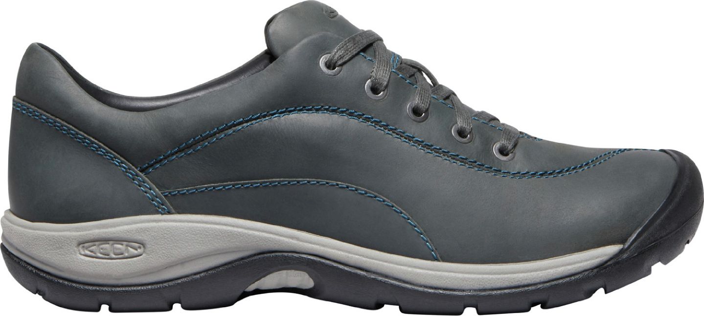 A low-cut grey shoe with a grey sole and laces.