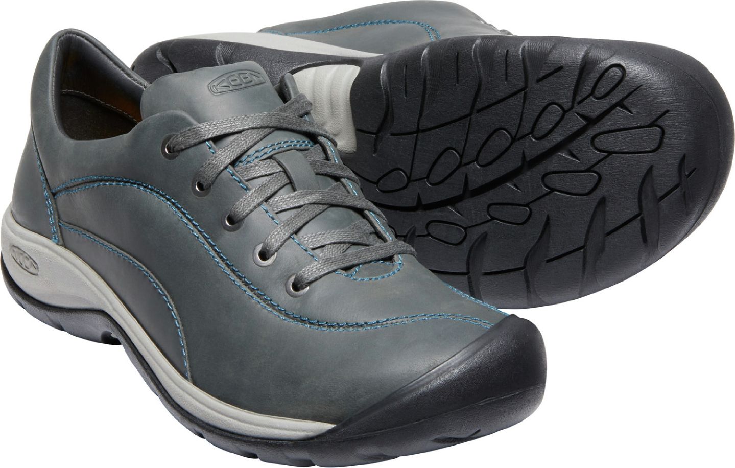 Gray leather lace-up casual shoe with a gray sole.
