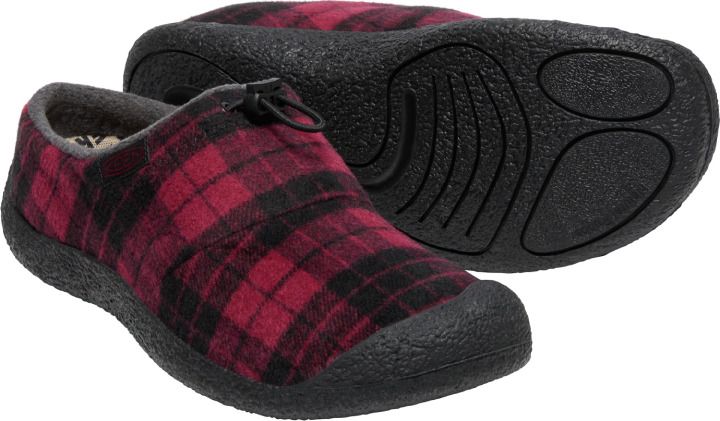 Red and black plaid slipper with dark sole and toe cap, seen from the side and rear.