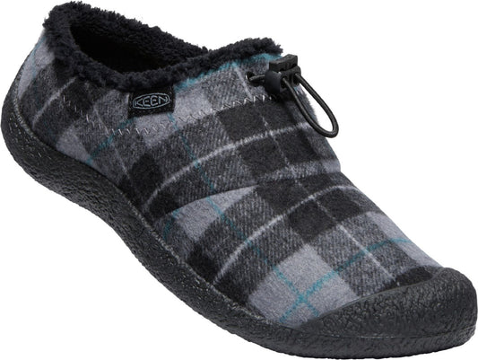 Slipper with a black and gray plaid pattern and a black drawstring closure.