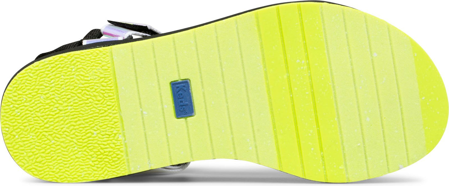 A shoe sole with yellow tread.