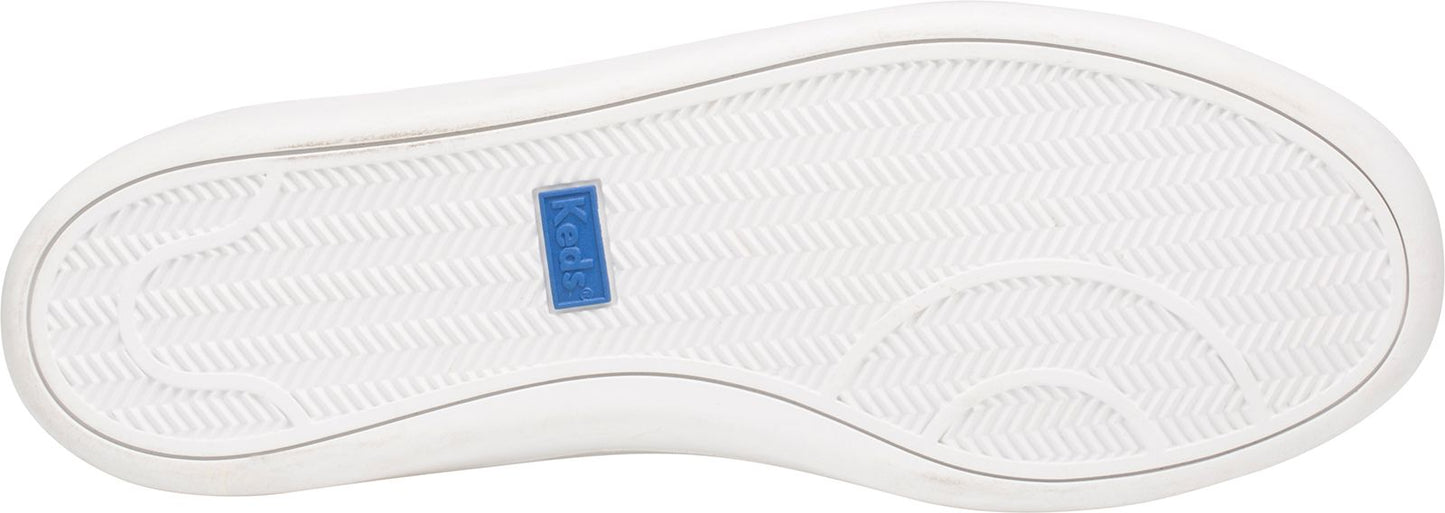 A white shoe sole with a blue label.