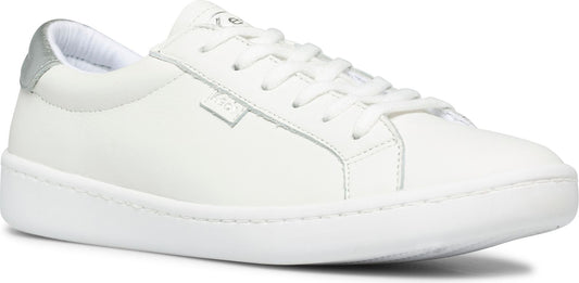 A white sneaker with white laces and a silver heel.