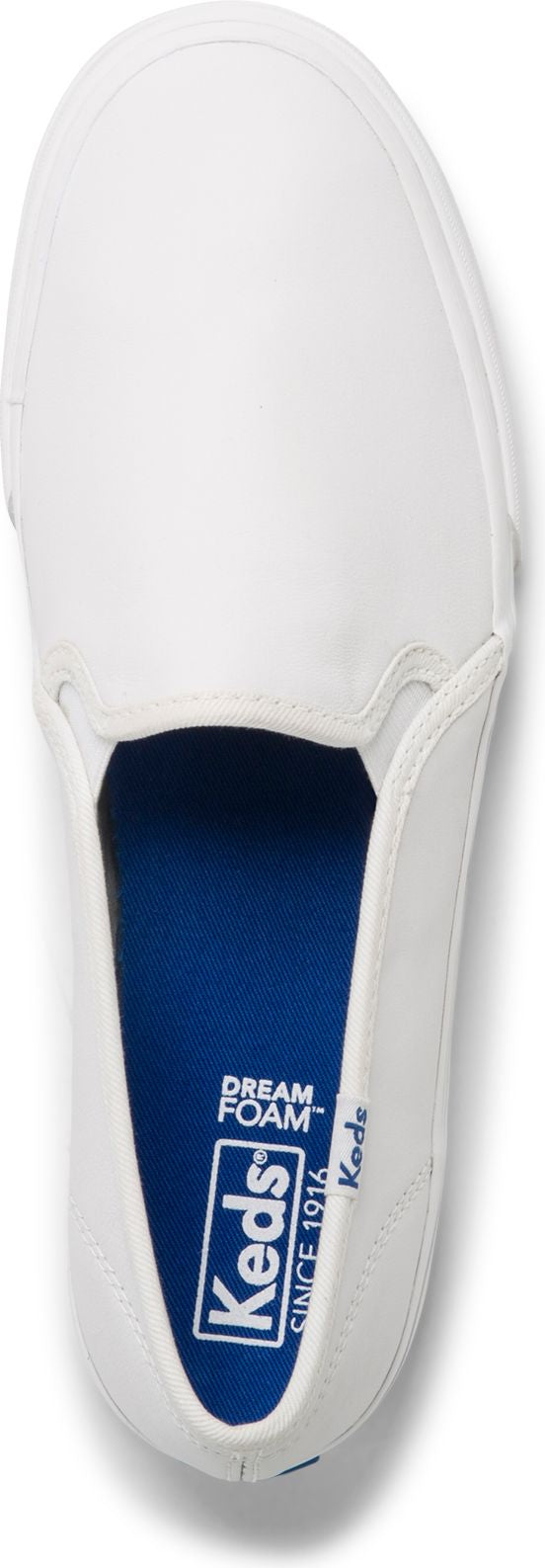 Slip on shoe with "DREAM FOAM" and "Keds Since 1916" on blue inner sole.