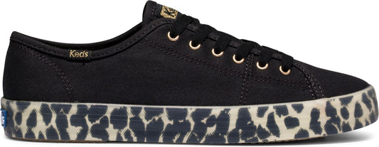 A black sneaker with leopard print soles, featuring a low-top design and lace-up closure.