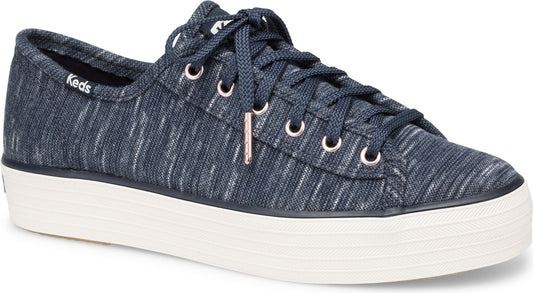 Low-top blue sneaker with white platform sole and white eyelets.