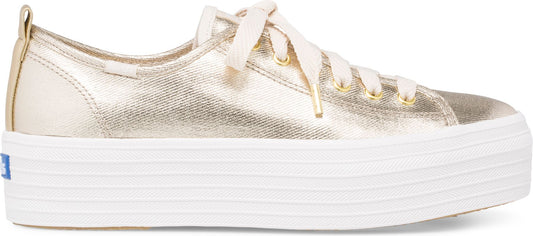 Gold sneaker with a thick white sole and matching laces.