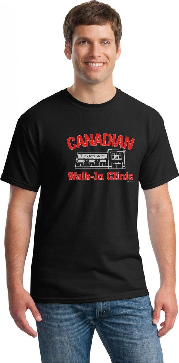 A man wears a black t-shirt with the words "Canadian Walk-in Clinic" on the front.