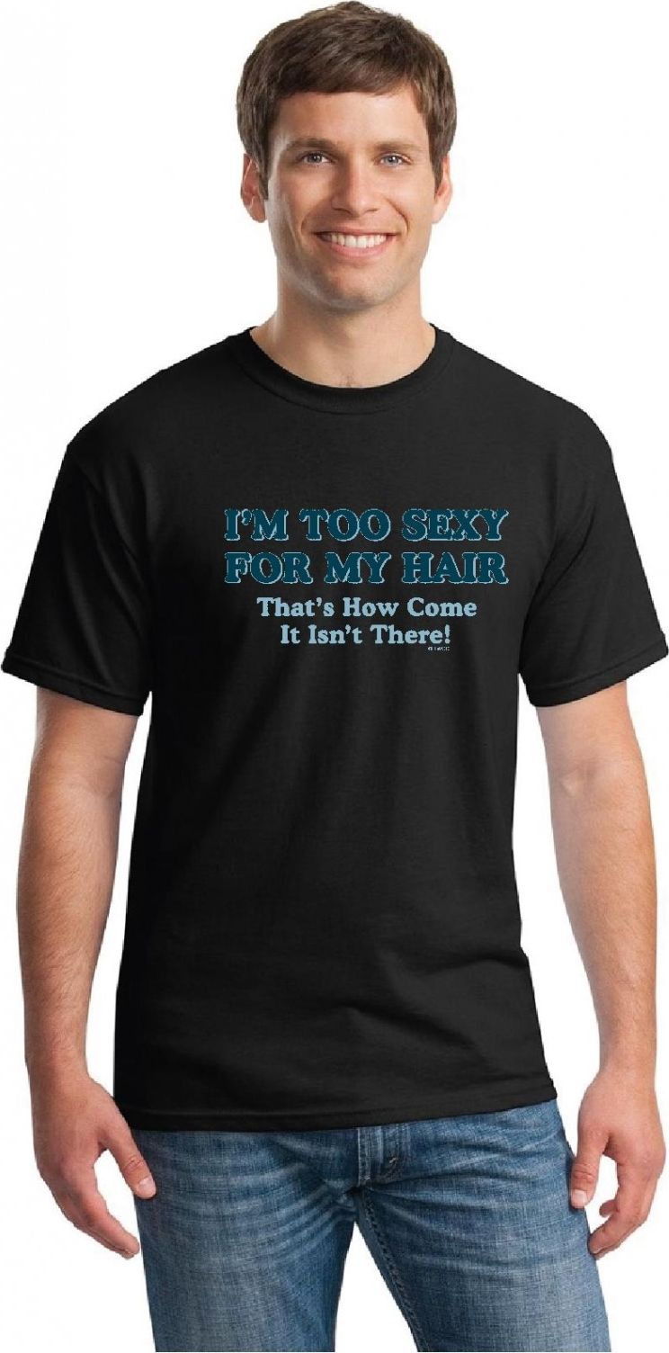 A man wearing a black t-shirt with the text "I'M TOO SEXY FOR MY HAIR That's How Come It Isn't There!" and jeans.
