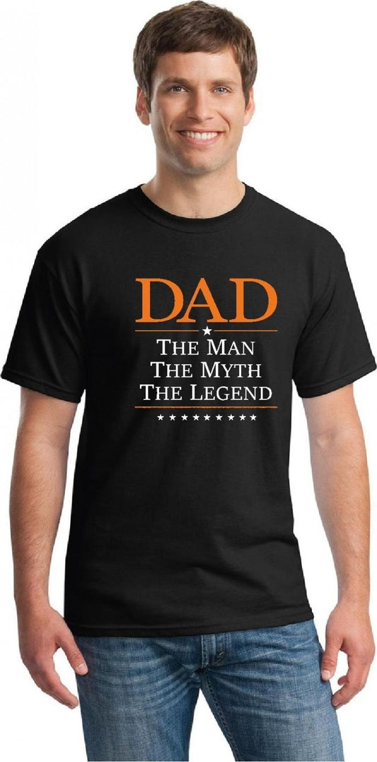 Man in a black t-shirt with orange lettering saying, "DAD The Man The Myth The Legend".