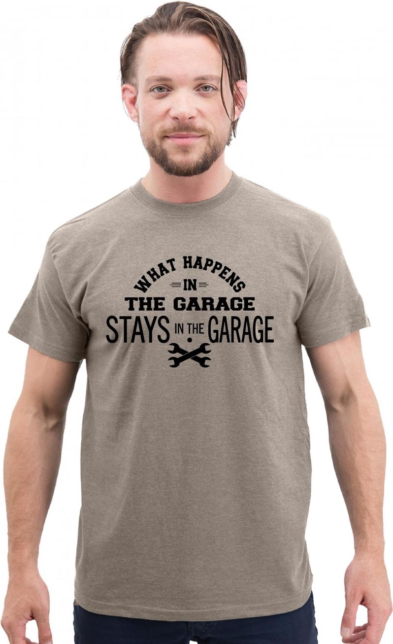 Man wearing a brown t-shirt with the text 'WHAT HAPPENS IN THE GARAGE STAYS IN THE GARAGE' in black ink with two crossed wrenches.
