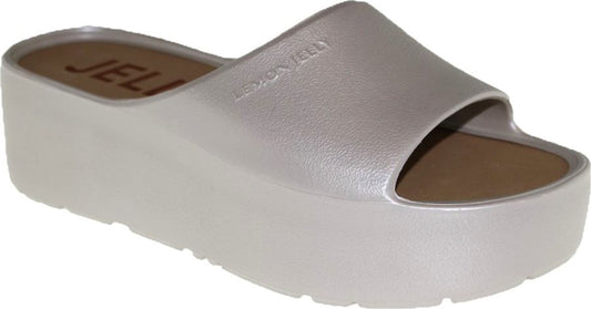 Silver platform slide sandal with a light brown insole and the word "LEMON JELLY" printed on the side.