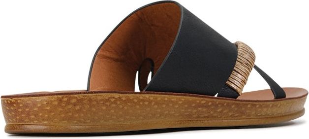 A sandal with a black leather upper and a tan sole with a toe thong.
