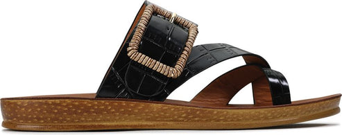 A black sandal with a square buckle.