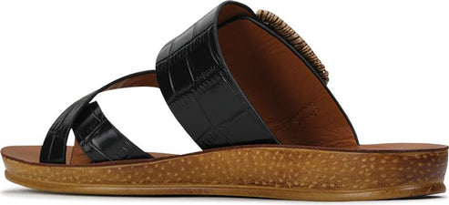 A black sandal with an open toe, a textured footbed and upper straps.