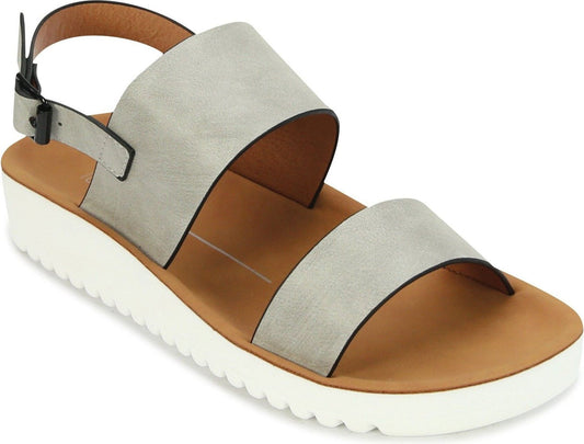 Gray faux-leather sandal with a white platform sole, two straps, and an ankle strap with a black buckle.