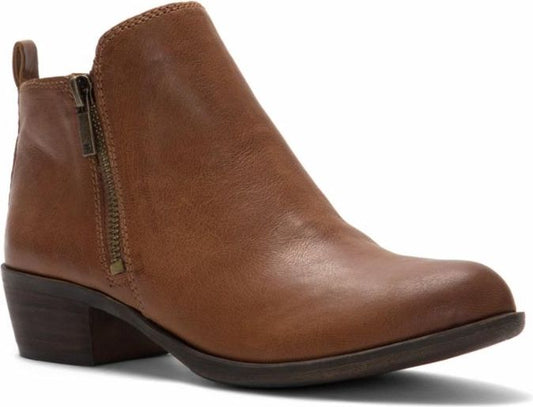 Tan leather ankle boot with side zipper and small heel