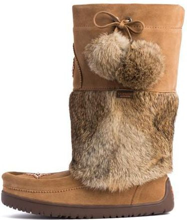 Tan high-top boot with a faux fur wrap and decorative pom-poms.