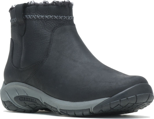Black ankle boot with faux fur trim and gray sole.