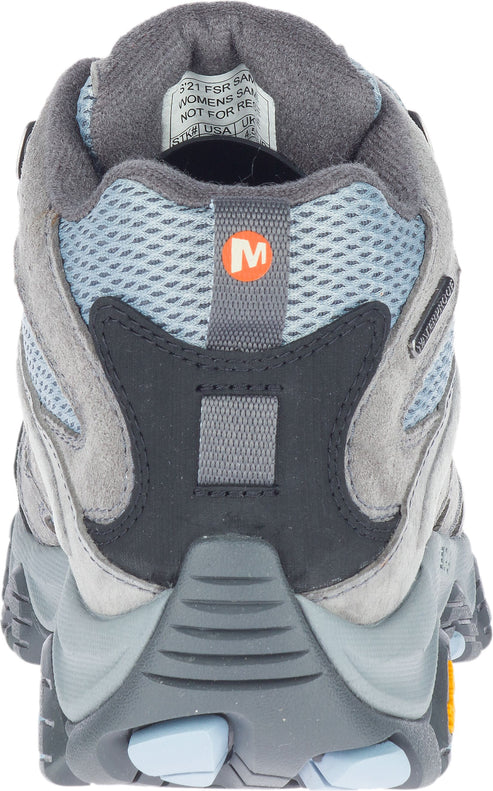 Back view of gray hiking boot with blue mesh, gray suede, and a logo with an orange "M".