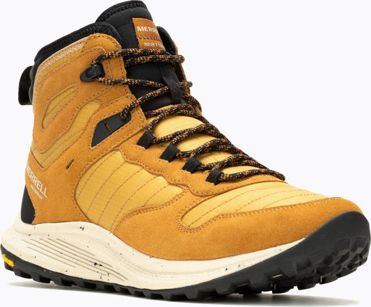 Tan and black hiking boot with speckled white sole and visible 'MERRELL' logo.