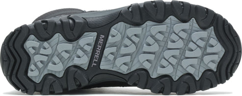 The shoe outsole showing deep treads with the brand MERRELL written vertically on the side.