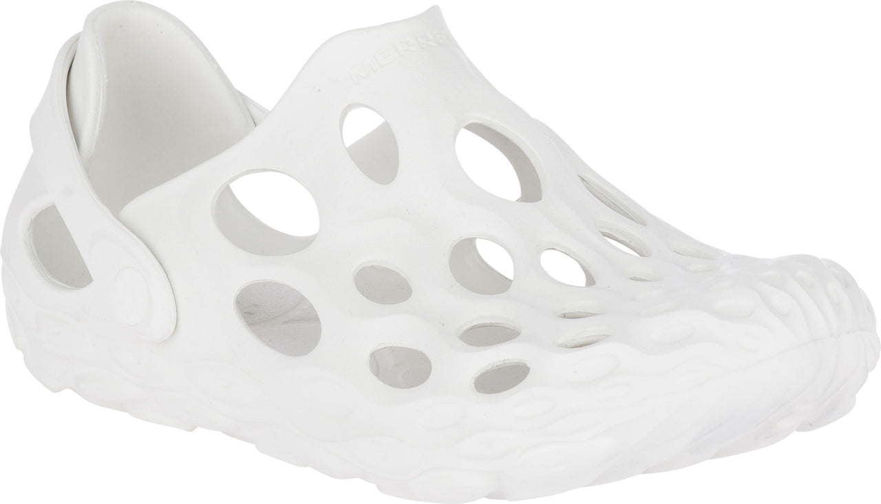 White slip-on shoe with numerous holes, rounded toe.
