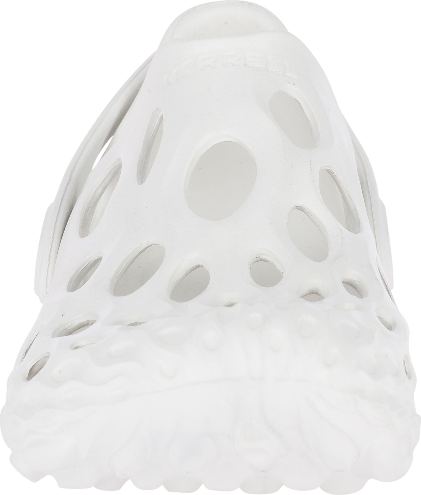 White shoe with decorative holes.