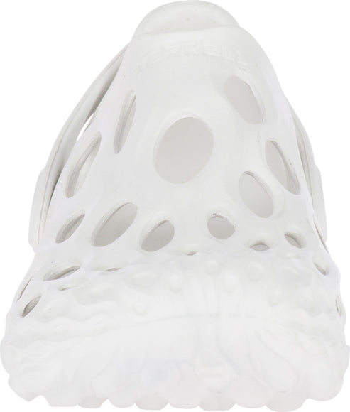White shoe with decorative holes.