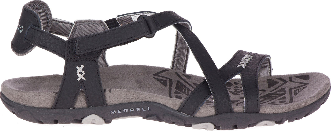 A black sandal with velcro straps.