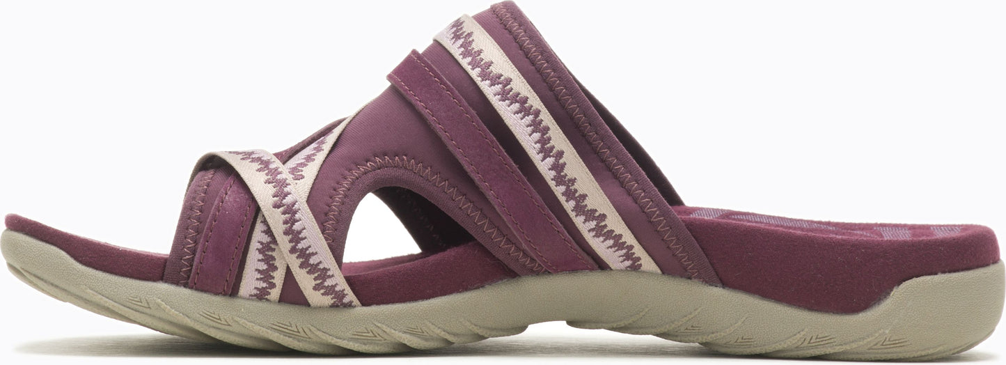 A purple sandal with crisscross straps.