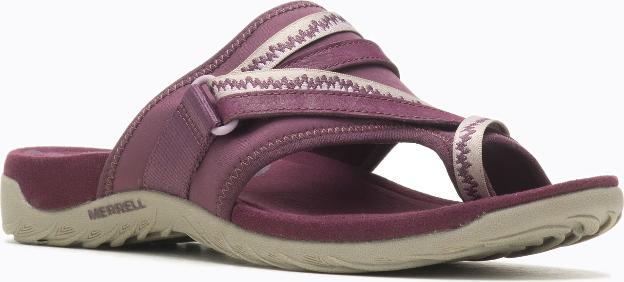 A purple sandal with woven straps.