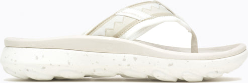 A white sandal with a thick speckled sole.