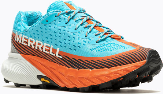 Close-up of a light blue athletic shoe with orange accents, laces, and sole; "MERRELL" in white letters is printed on the side of the shoe.