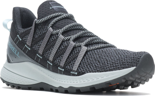 A low-profile black and gray sneaker with a knitted mesh upper, light gray midsole, and a dark gray lugged outsole.